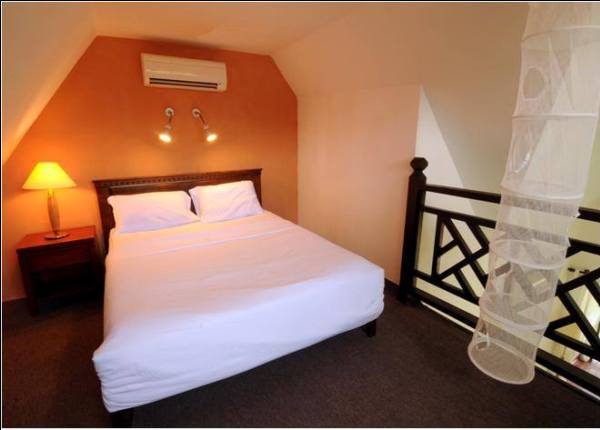 Paya Beach Resort Deluxe Chalet Bedroom